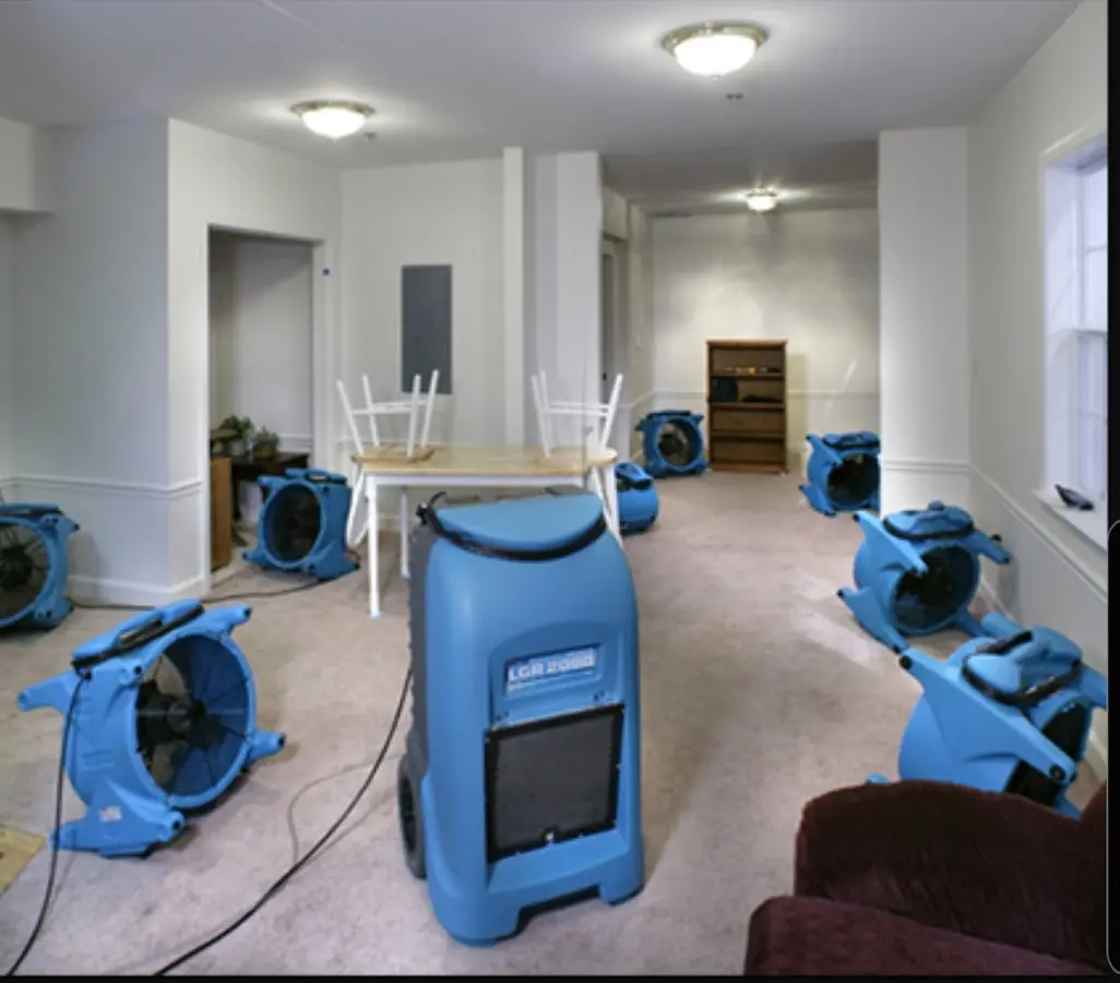 Air movers and dehumidifier setup for Water Damage Restoration in New Cumberland